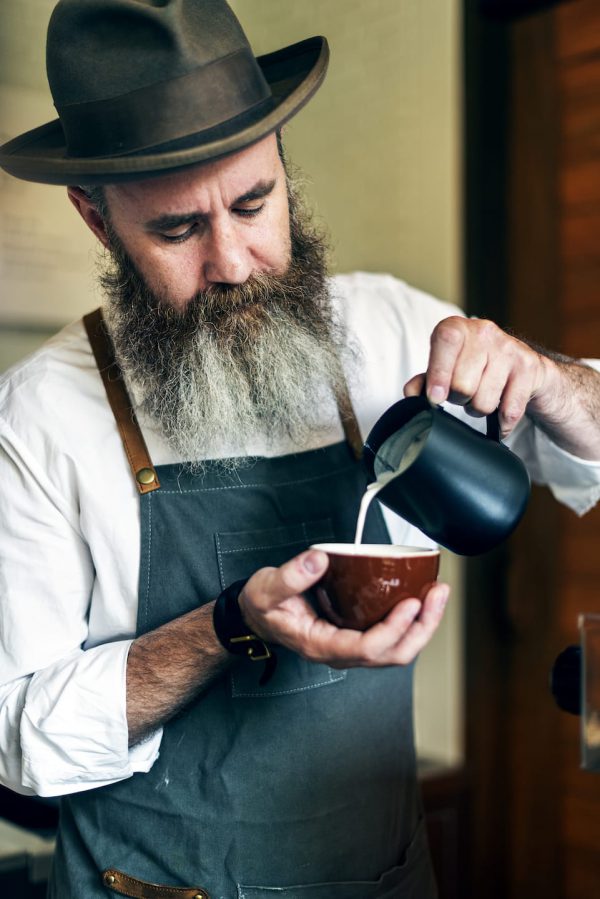 Barista making coffee